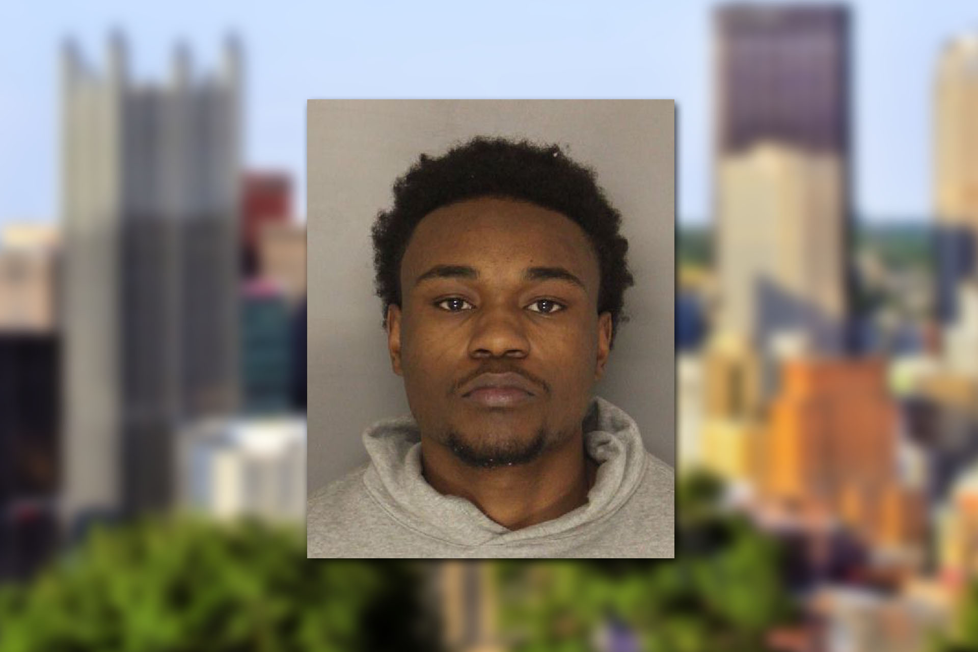 Mugshot provided by the Allegheny County Jail. Background photo credit: Bruce Emmerling / Pixabay