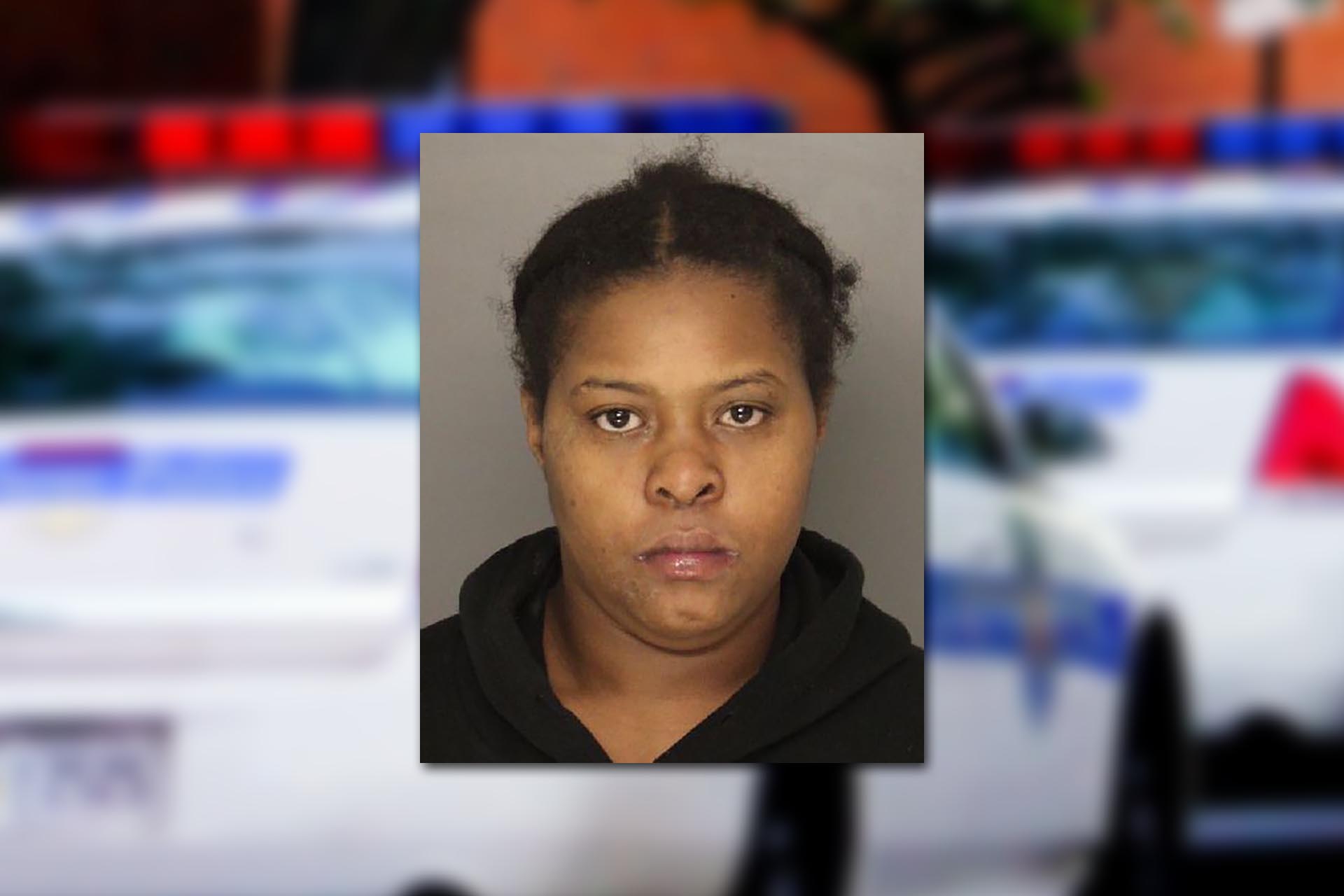 Casey Monique Briggs-Morris. Mugshot provided by the Allegheny County Jail. Background photo credit: Bruce Emmerling / Pixabay.
