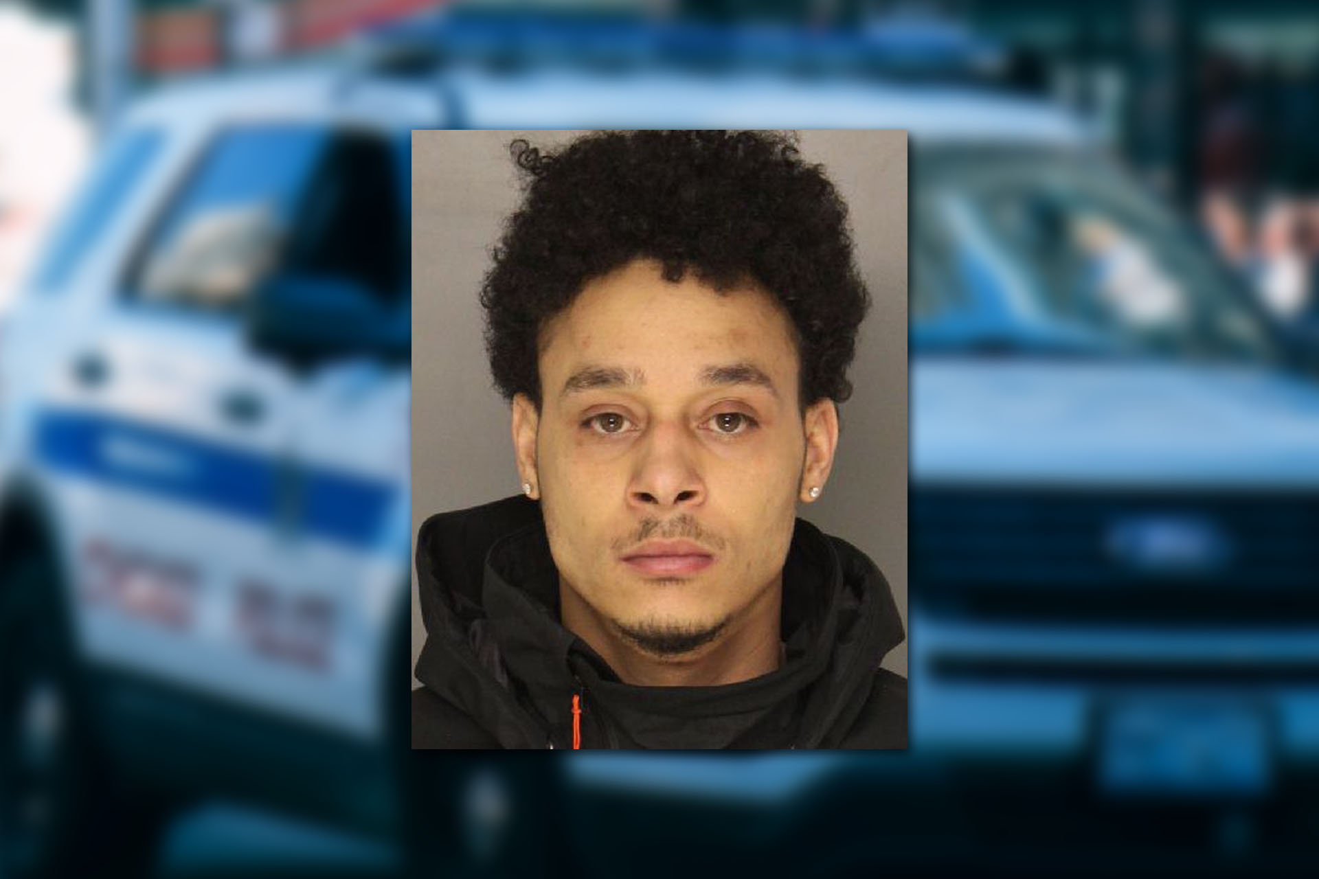 Mugshot provided by the Allegheny County Jail. Background photo credit: Ricky Esquivel / Pexels