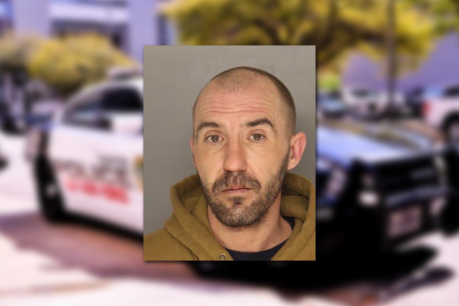 David Michael Gordon. Mugshot provided by the Allegheny County Jail. Background photo credit: F. Muhammad / Pixabay.