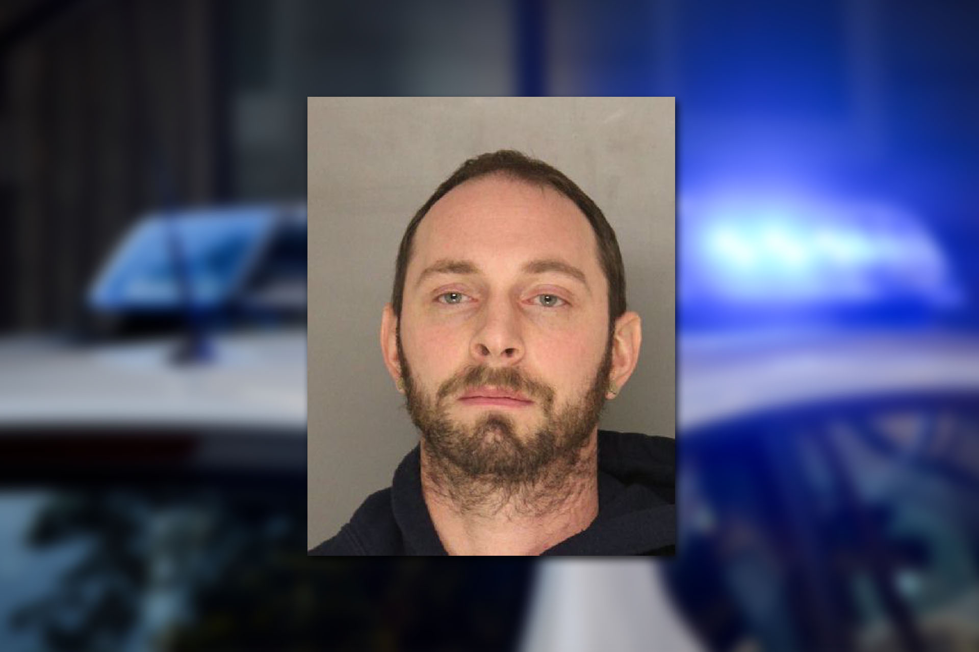 Mugshot provided by the Allegheny County Jail. Background photo credit: Pixabay