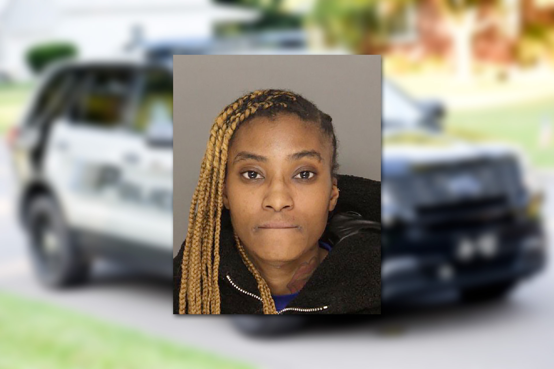 Kacey Roberts. Mugshot provided by the Allegheny County Jail. Background photo credit: OlinEJ / Pixabay.