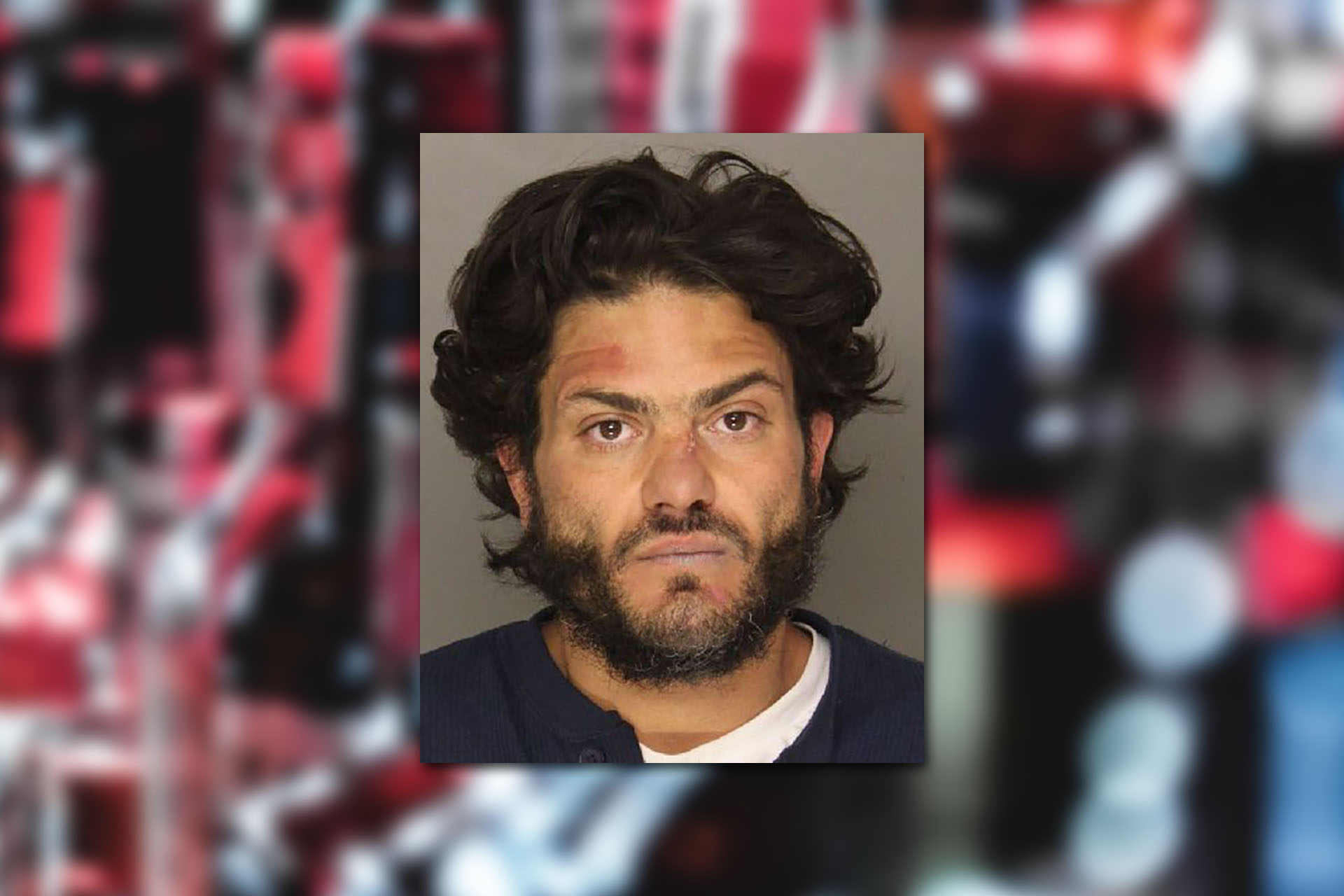 Nicholas Peluso. Mugshot provided by the Allegheny County Jail. Background photo credit: Clam Lo/Pexels.