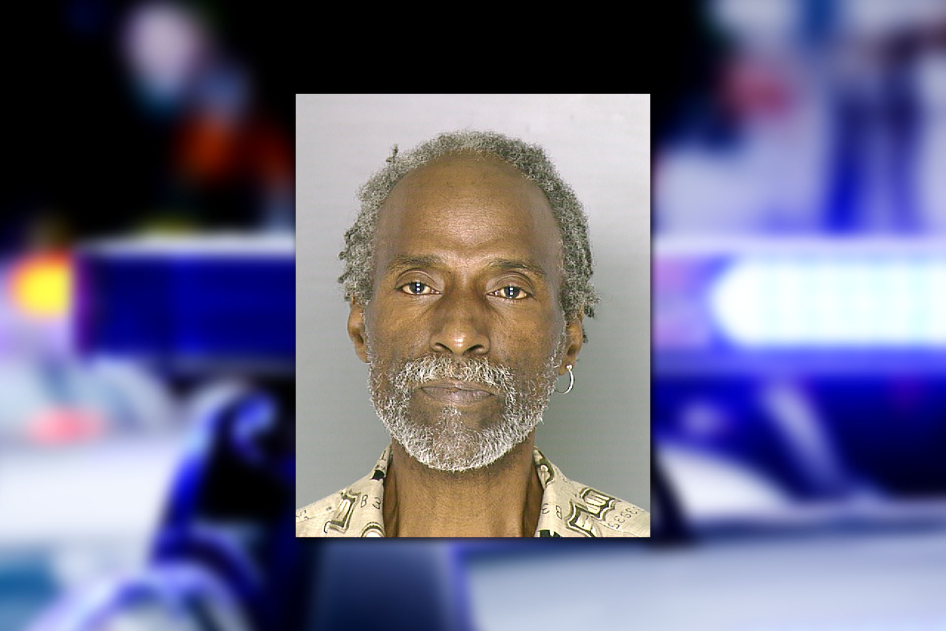 R. Gardenhire Bey, as seen in a 2006 mugshot provided by the Allegheny County Jail. Background photo credit: Diego Parra / Pixabay
