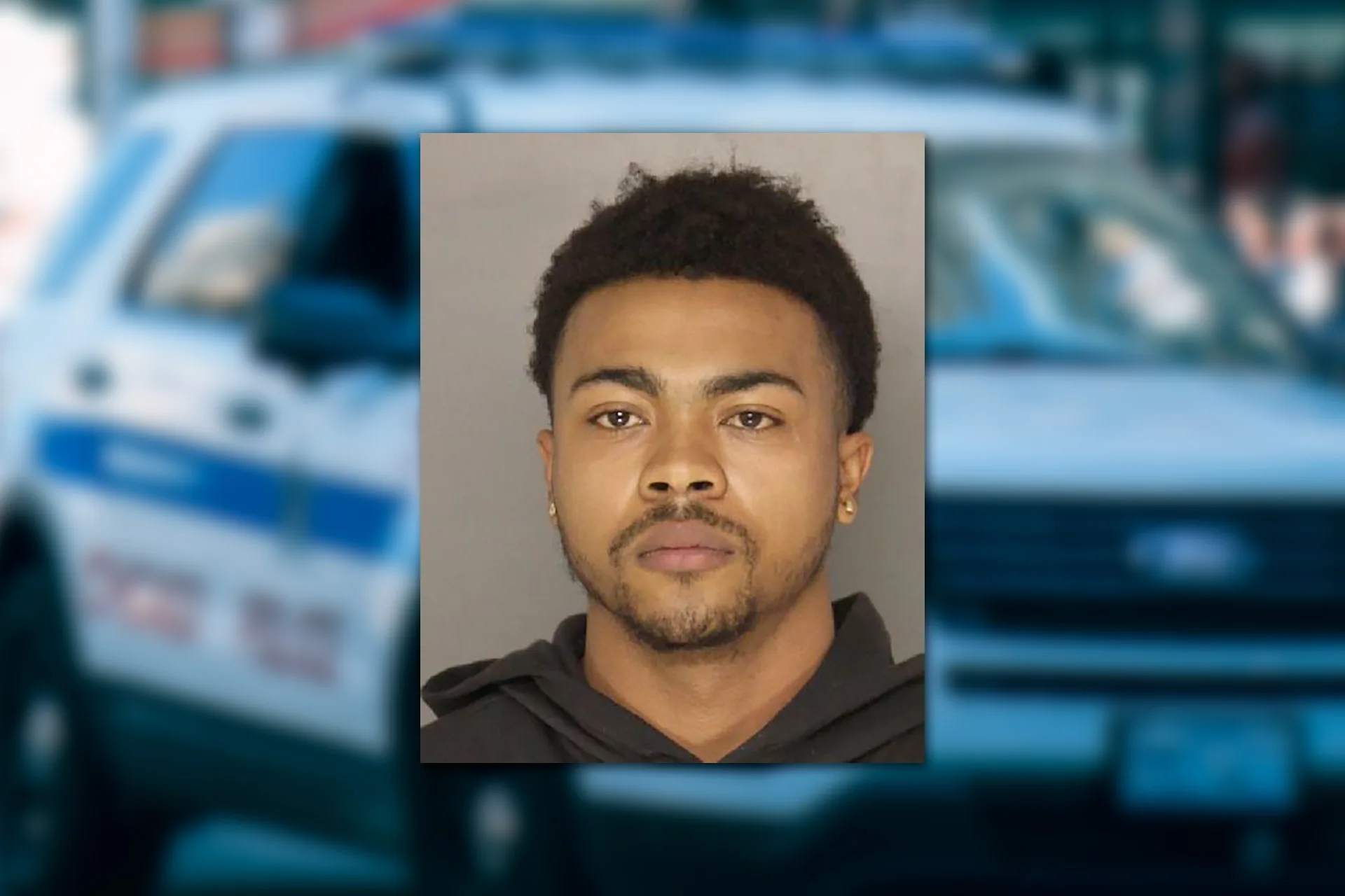 Deon Cortez Dutrieuille. Mugshot provided by the Allegheny County Jail. Background photo credit: Ricky Esquivel / Pexels.