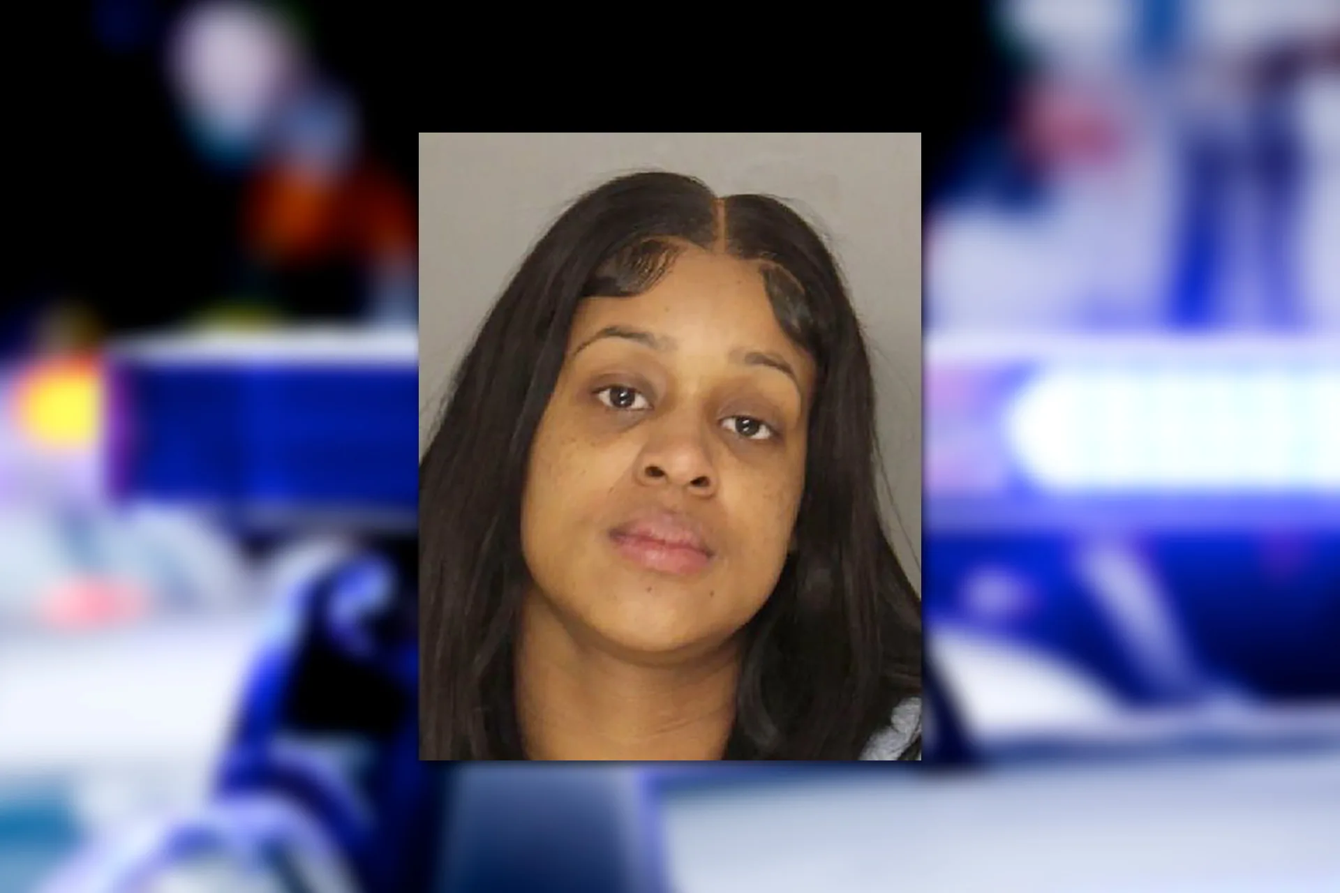 Leona L. Morris. Mugshot provided by the Allegheny County Jail. Background photo credit: Diego Parra / Pixabay.
