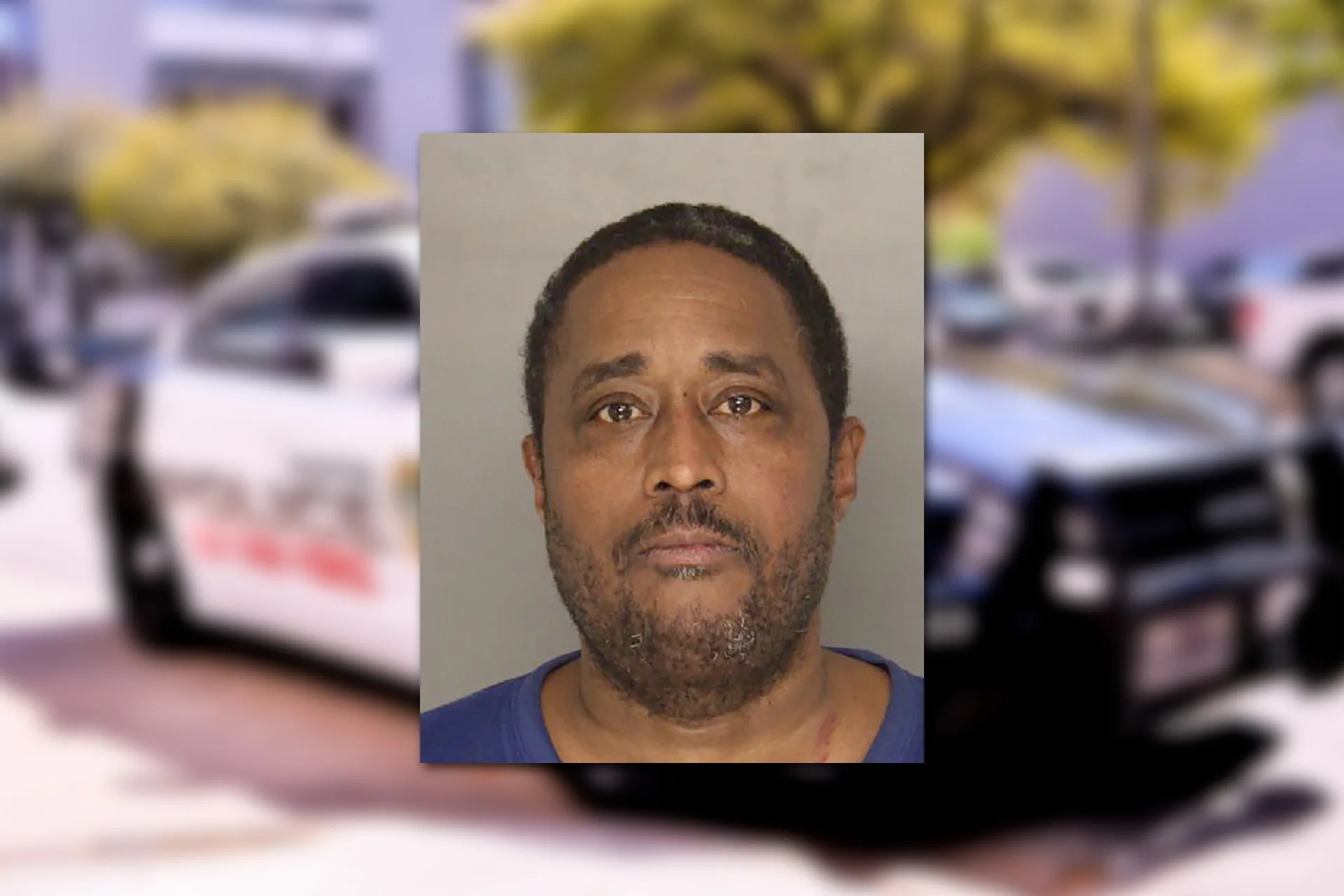 Shawn Hogan. Mugshot provided by the Allegheny County Jail. Background photo credit: F. Muhammad / Pixabay.