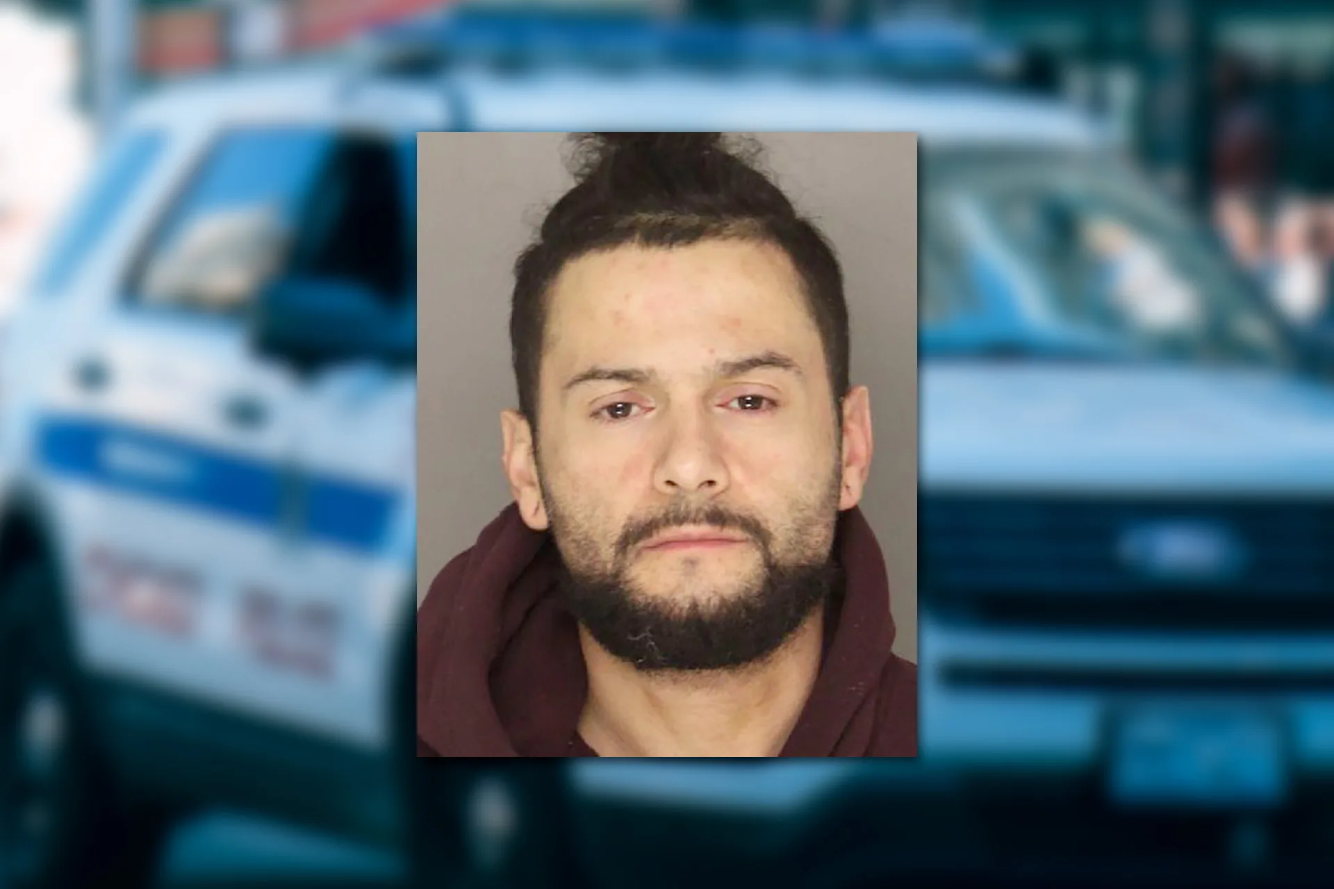 Timothy Sanchez. Mugshot provided by the Allegheny County Jail. Background photo credit: Ricky Esquivel / Pexels.