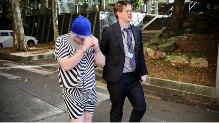 NSW Police arrest a man in "international satanic child sex abuse material ring," investigation on November 27, 2025. Portions of this photo were blurred by the police force. (via NSW Police Force)
